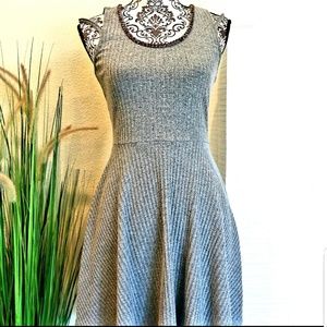 women gray color mini dress with beaded neckline